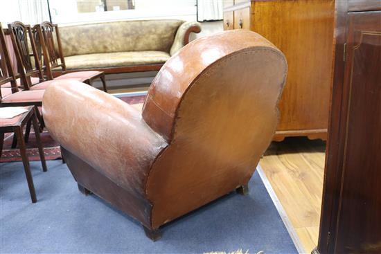 A 1940s French leather club armchair